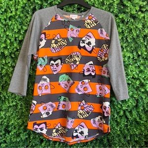 LuLaRoe Medium Randy Raglan 3/4 Sleeve TShirt Orange/Gray Halloween Masks
